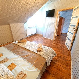 apartament z aneksem kuchennym - sypialnia